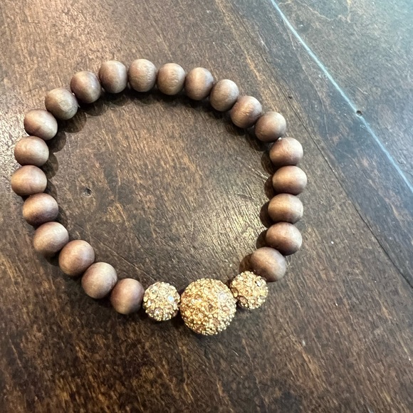 Stella & Dot, brown wood beads with gold center. Lovely piece. Stretch - Picture 3 of 4